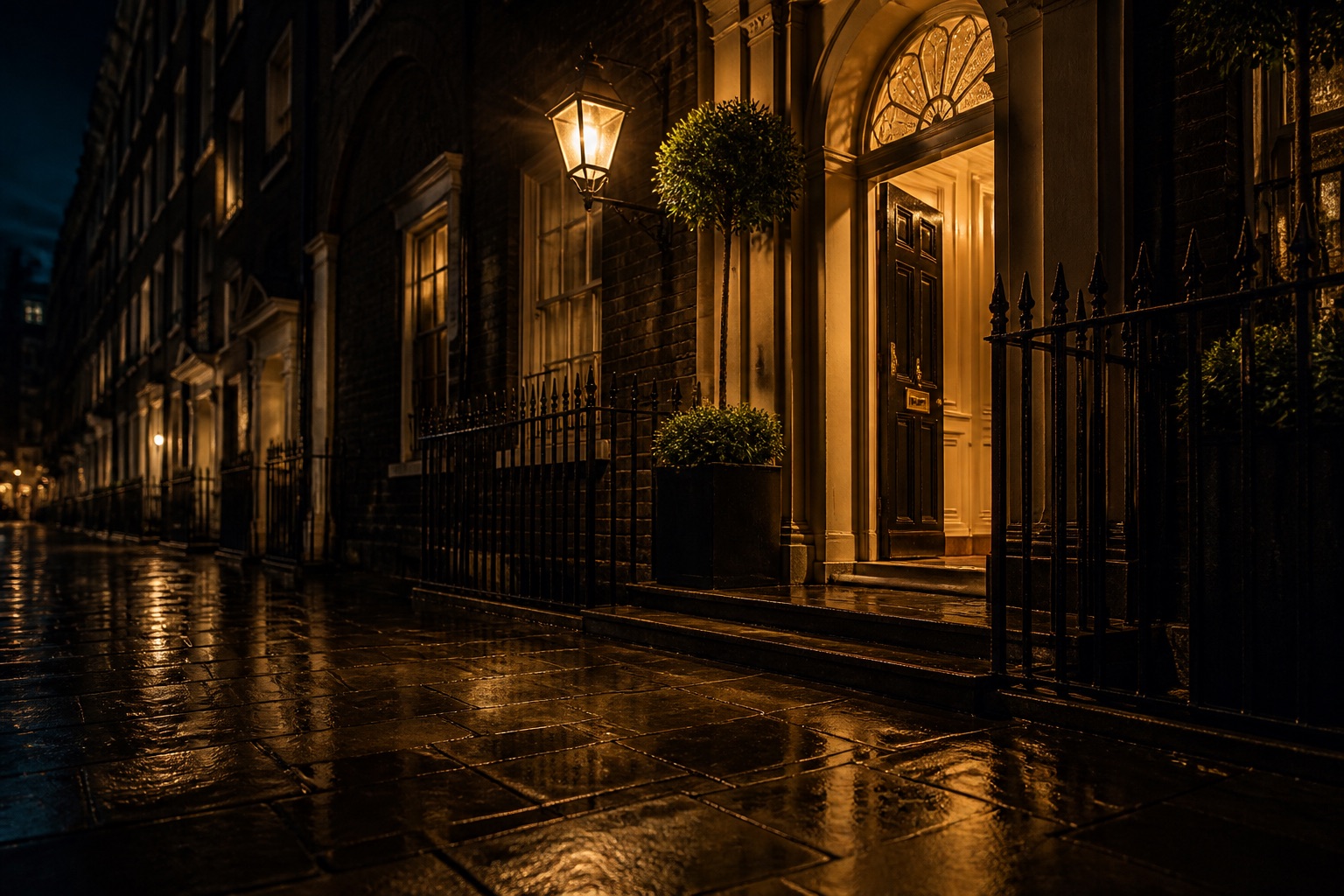 Rain-slick London townhouse at night with warm doorway light — atmospheric brand photography for Pulse Lynx